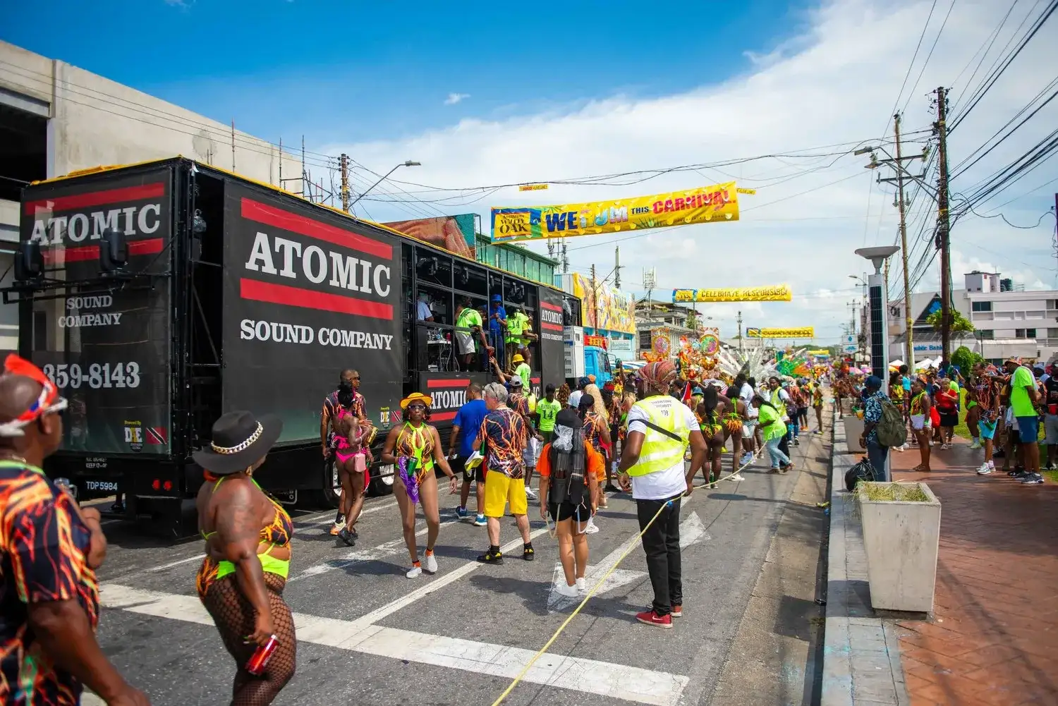 The Atomic Sound Company truck with Showtime masqueraders on Carnival Monday